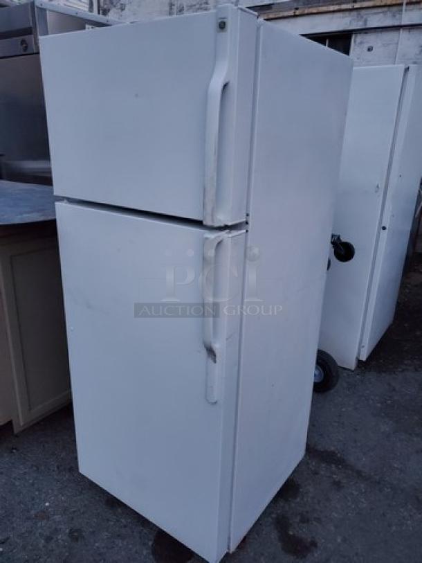 GE Top-Freezer Refrigerator. Unknown condition in regards to the top (Freezer) section. Sold as is. - Image 1 of 5
