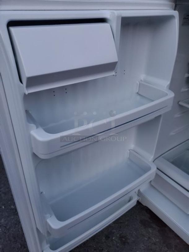 GE Top-Freezer Refrigerator. Unknown condition in regards to the top (Freezer) section. Sold as is. - Image 4 of 5