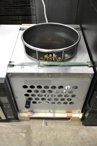 BRAND NEW SCRATCH AND DENT! Cooking Performance Group CPG 351WOKR13N Stainless Steel Commercial Single Burner Natural Gas Powered Wok Range. 95,000 BTU.