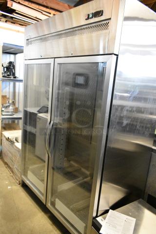 BRAND NEW SCRATCH AND DENT! 2023 Avantco 178Z2RGHC Stainless Steel Commercial 2 Door Reach In Cooler Merchandiser on Commercial Casters. 115 Volts, 1 Phase. Tested and Working!