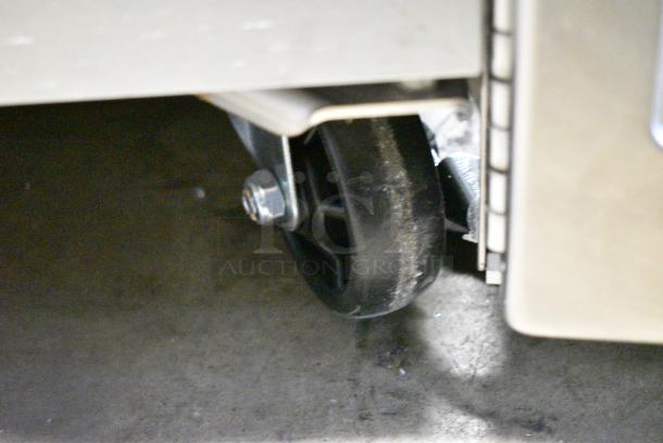 BRAND NEW SCRATCH AND DENT! 2023 Avantco 178Z2RGHC Stainless Steel Commercial 2 Door Reach In Cooler Merchandiser on Commercial Casters. 115 Volts, 1 Phase. Tested and Working! - Image 3 of 7