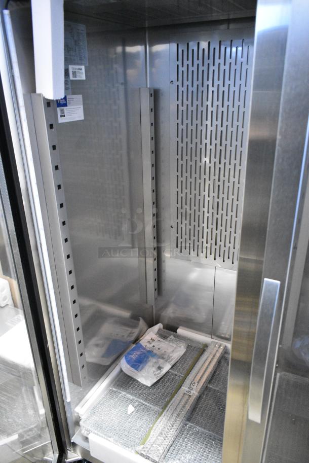 BRAND NEW SCRATCH AND DENT! 2023 Avantco 178Z2RGHC Stainless Steel Commercial 2 Door Reach In Cooler Merchandiser on Commercial Casters. 115 Volts, 1 Phase. Tested and Working! - Image 4 of 7