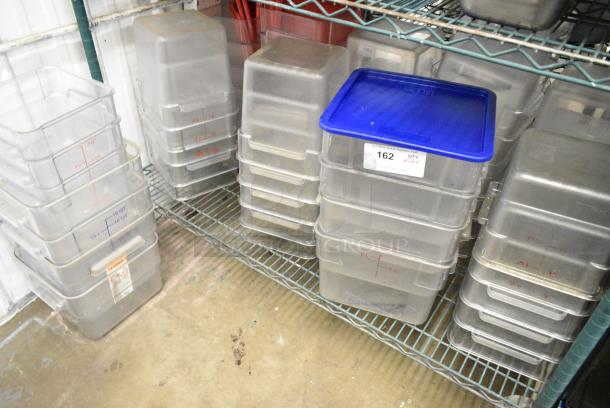 ALL ONE MONEY! Lot of 50 Various Clear Poly Bins, Blue Lid, Red Lids. - Image 1 of 5