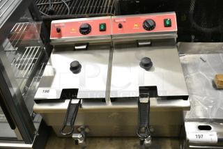 BRAND NEW SCRATCH AND DENT! 2024 Avantco 177F202 Stainless Steel Commercial Countertop Electric Powered 2 Bay Fryer w/ 2 Metal Fry Baskets and 2 Lids. 208-240 Volts, 1 Phase.
