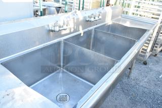 Stainless Steel 3 Bay Sink w/ Dual Drain Boards, 2 Faucets and 2 Handle Sets. Bays 24x24x14. Drain Boards 22x26