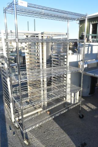 Chrome Finish 5 Tier Wire Shelving Unit on Commercial Casters. BUYER MUST DISMANTLE. PCI CANNOT DISMANTLE FOR SHIPPING. PLEASE CONSIDER FREIGHT CHARGES.
