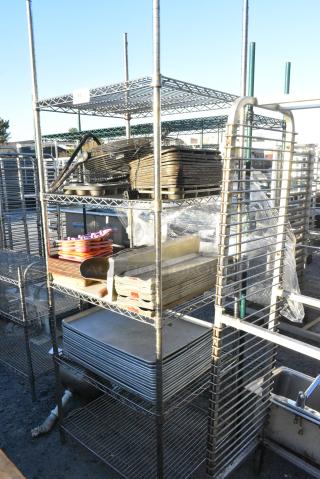 Chrome Finish 5 Tier Wire Shelving Unit w/ Contents Including Metal Baking Pans. BUYER MUST DISMANTLE. PCI CANNOT DISMANTLE FOR SHIPPING. PLEASE CONSIDER FREIGHT CHARGES.