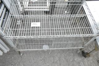 Chrome Finish 2 Tier Wire Shelving Unit. BUYER MUST DISMANTLE. PCI CANNOT DISMANTLE FOR SHIPPING. PLEASE CONSIDER FREIGHT CHARGES.