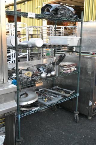 Various Items Including Utensils. Does Not Include Shelving Unit