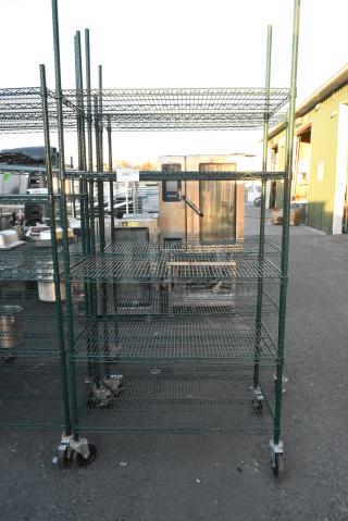 Green Finish 4 Tier Wire Shelving Unit on Commercial Casters. BUYER MUST DISMANTLE. PCI CANNOT DISMANTLE FOR SHIPPING. PLEASE CONSIDER FREIGHT CHARGES.