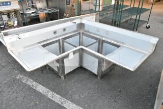 BRAND NEW SCRATCH AND DENT! Regency 600S31620C Stainless Steel Commercial L Shaped 3 Bay Sink w/ Dual Drain Boards. No Legs. Bays 16x20x14. Drain Boards 16x22