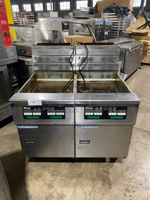 Pitco Solstice Supreme Series Commercial Natural Gas Powered Floor Style Double Bay Deep Fat Fryer!  With Backsplash! All Stainless Steel! On Casters! 115V! Model: SSH75 SN: G1CB091291! Working When Removed! - Image 1 of 13