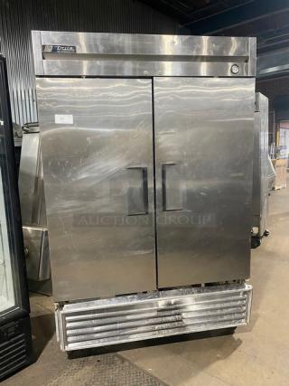 True Commercial 2 Door Reach In Refrigerator! All Stainless Steel! With Poly Coated Racks! On Casters! 115V 1 Phase! Model: T-49 SN: 1-2606276!