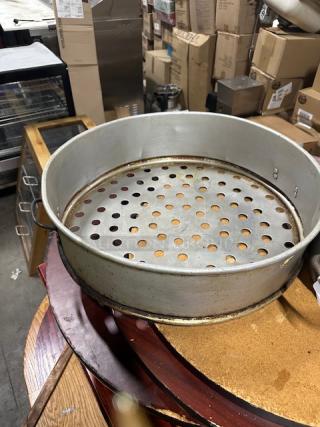 One Perforated Aluminum Pan. 23X7