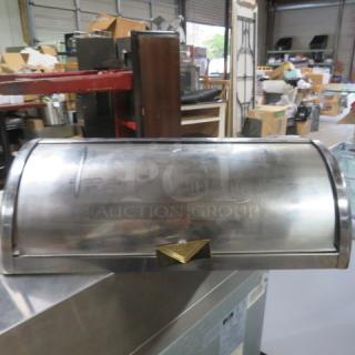 One Stainless Steel Roll Top Full Size Chafer Lid.