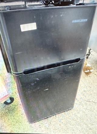 One Black And Decker Refrigerator/Freezer. 115 Volt. Model# BCD33B. Freezer Working, Cooler Not Cold Enough. 19X19X33.5.