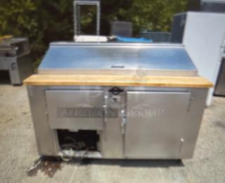 One Universal 2 Door Refrigerated Prep Table With 2 Outlets, And Wooden Cutting Board. Missing Lower Panel. 60X33X45
