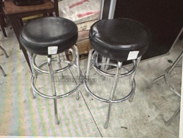 Double Chrome Ring Bar Stool With Black Cushioned Swivel Seat. Need To Be Recovered. 2XBID - Image 1 of 1