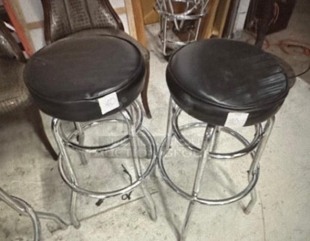 Double Chrome Ring Bar Stool With Black Cushioned Swivel Seat. Need To Be Recovered. 2XBID - Image 1 of 1