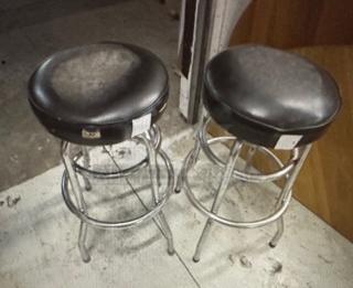 Double Chrome Ring Bar Stool With Black Cushioned Swivel Seat. Need To Be Recovered. 2XBID