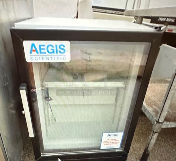 One NEW Aegis I Door Glass Display Cooler With 2 Racks And Keys. 120 Volt. Model# 2-F-5. 23X24X30.5 - Image 1 of 1