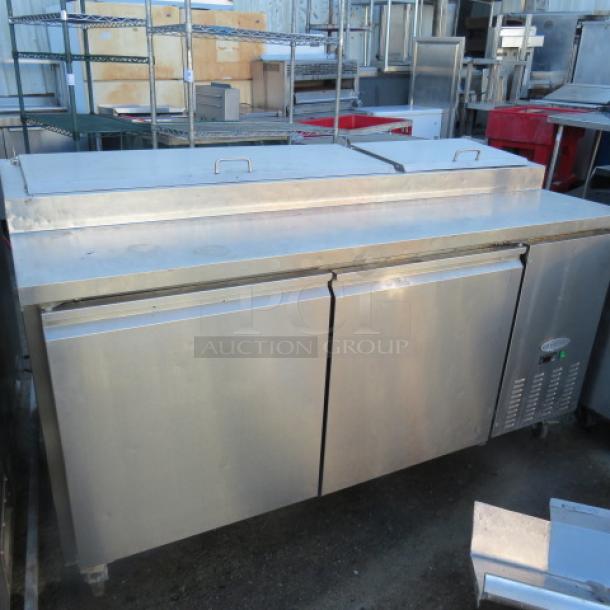 One Servware 2 Door Refrigerated Prep Table With 2 Racks, On Casters. 115 Volt. Model# PP67-9. 71X32X40. $4118.40. - Image 1 of 2
