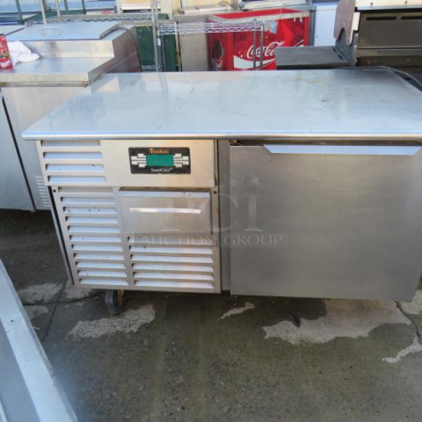 One Traulsen Stainless Steel 1 Door 50lb Undercounter Smart Chill Blast Chiller  Freezer With 3 Racks On Casters. Model# RBC50-ZWM12. 115 Volt. 54X34X33 - Image 1 of 3