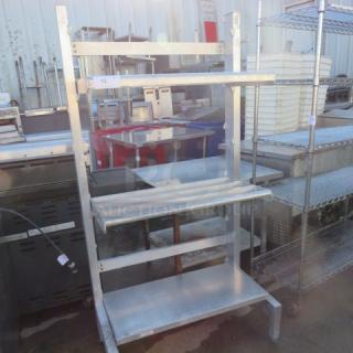 One Aluminum Dunnage Shelf With 3 Moveable Shelves. 2 Slotted, 1 Solid. 38X21X72