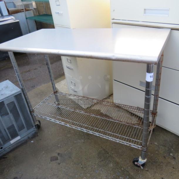 One Stainless Steel Table With A Metro Under Shelf, On Casters. 49.5X24X39 - Image 1 of 1