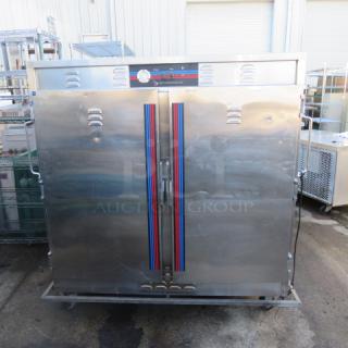 One Stainless Steel Hot Food Box With 3 Shelves On Casters. Model# BQ150. 120 Volt. 67X33X65.5