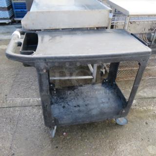 One Rubbermaid 2 Shelf Cart On Casters. 38X18X34
