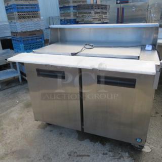One Hoshizaki 2 Door Refrigerated Prep Table With 2 Racks On Casters. Model# CRMR48-18M. 115 Volt. 48X38X45. $4860.00.