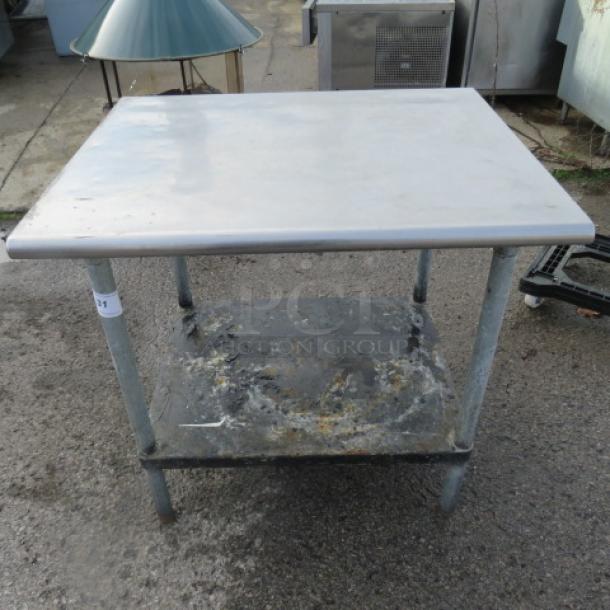 One Stainless Steel Table WIth Under Shelf. 36X30X34 - Image 1 of 1