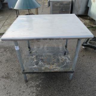 One Stainless Steel Table WIth Under Shelf. 36X30X34