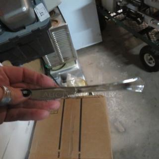 One Lot Of Poly Knives.