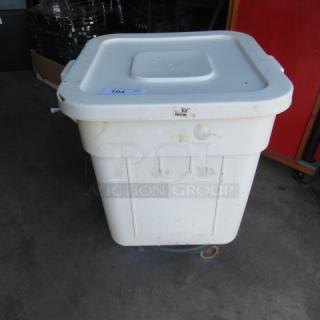 One Continental Huskee Ingredient Bin With Lid On A Dolly.