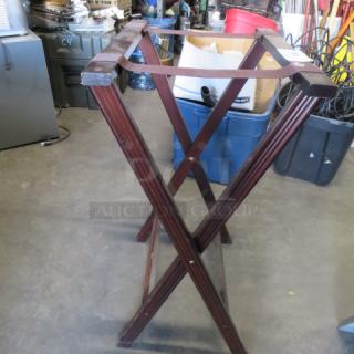 One Wooden Tray Stand.
