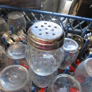 One Lot Of 30 Cheese/Pepper Shakers With Lids.