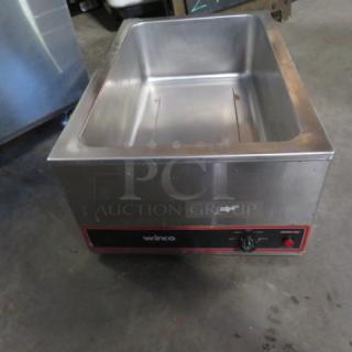 One Winco Food Warmer. Model# FWS500. 120 Volt.