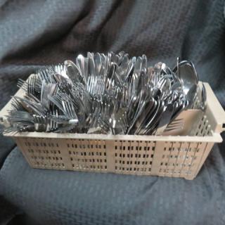 One Mega Lot Of Flatware In A Dishwasher Flatware Rack.