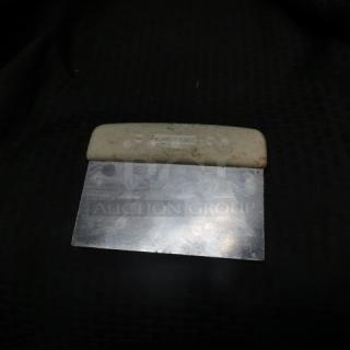 One Dexter Dough Scraper.