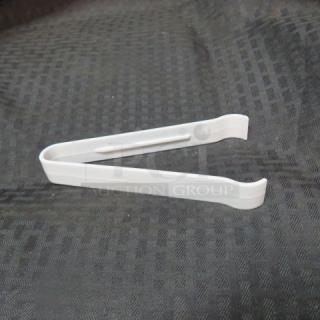 One Lot Of 8 Poly Tongs.