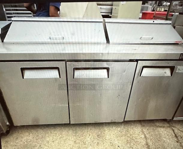 One Supra 3 Door Refrigerated Pizza Prep Table On Casters. Model# SSPT3R-1. 115 Volt. 72.5X30X43.5. - Image 1 of 2