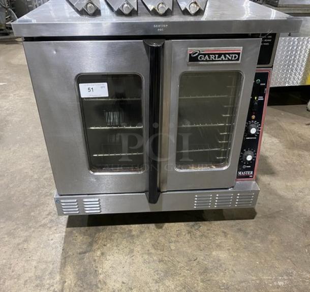 GREAT! Garland Master 200 Series Commercial Natural Gas Powered Single Deck Convection Oven! All Stainless Steel! With Metal Oven Racks! With Legs! - Image 1 of 9