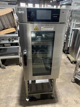 WOW! 2020 Late Model!  Alto Shaam Commercial Electric Powered Half Size Multi-Cook Oven! With 4 Cooking Chamber Zones! With Individual Controls! On Storage Shelf With 5 Pan Holding Rack! All Stainless Steel! With Metal Oven Racks! On Casters! 208-240V 3 Phase! Model: VMC-H4H SN: 2732953-000! Working When Removed!