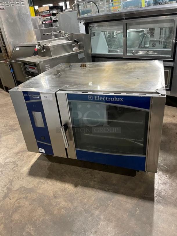 Electrolux Air-O-Convect Touchline Series Commercial Natural Gas Powered Full Sized Boilerless Combi Oven! All Stainless Steel! With Metal Oven Racks! On Legs! 120V 1 Phase!  Model: AOS062GKP1 SN: 23410001! - Image 1 of 8