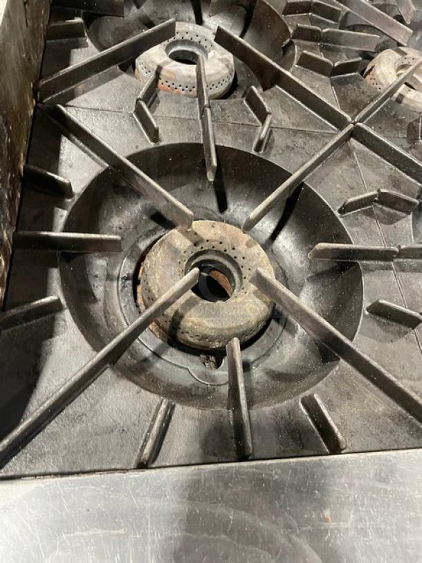 Vulcan Commercial Natural Gas Powered 6 Burner Range Split Top With Flat Griddle! With 2 Full Sized Ovens Underneath! All Stainless Steel! With Metal Oven Racks! On Casters! Working When Removed! - Image 8 of 11