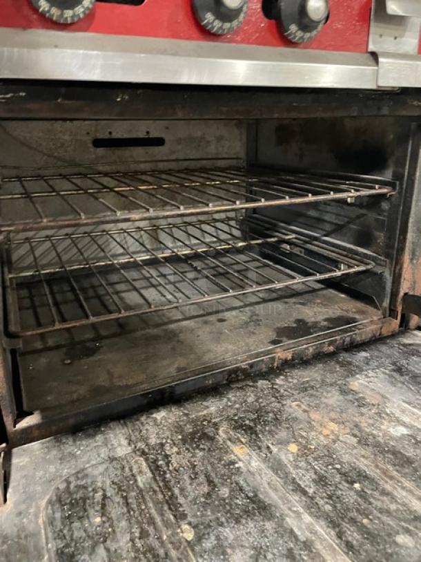Vulcan Commercial Natural Gas Powered 6 Burner Range Split Top With Flat Griddle! With 2 Full Sized Ovens Underneath! All Stainless Steel! With Metal Oven Racks! On Casters! Working When Removed! - Image 10 of 11