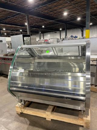 Hussmann Commercial Non-Glare Curved Lift Up Front Glass Gelato/Ice Cream Freezer Merchandiser/Display Case! With 2 Sliding Door Rear Access! All Stainless Steel! With Air Sweep Defogger! On Legs! 120/208/240V! Model: Q1-LC-4-R SN: 1031028201390552!