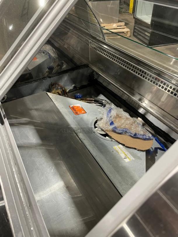 Hussmann Commercial Non-Glare Curved Lift Up Front Glass Gelato/Ice Cream Freezer Merchandiser/Display Case! With 2 Sliding Door Rear Access! All Stainless Steel! With Air Sweep Defogger! On Legs! 120/208/240V! Model: Q1-LC-4-R SN: 1031028201390552! - Image 5 of 8